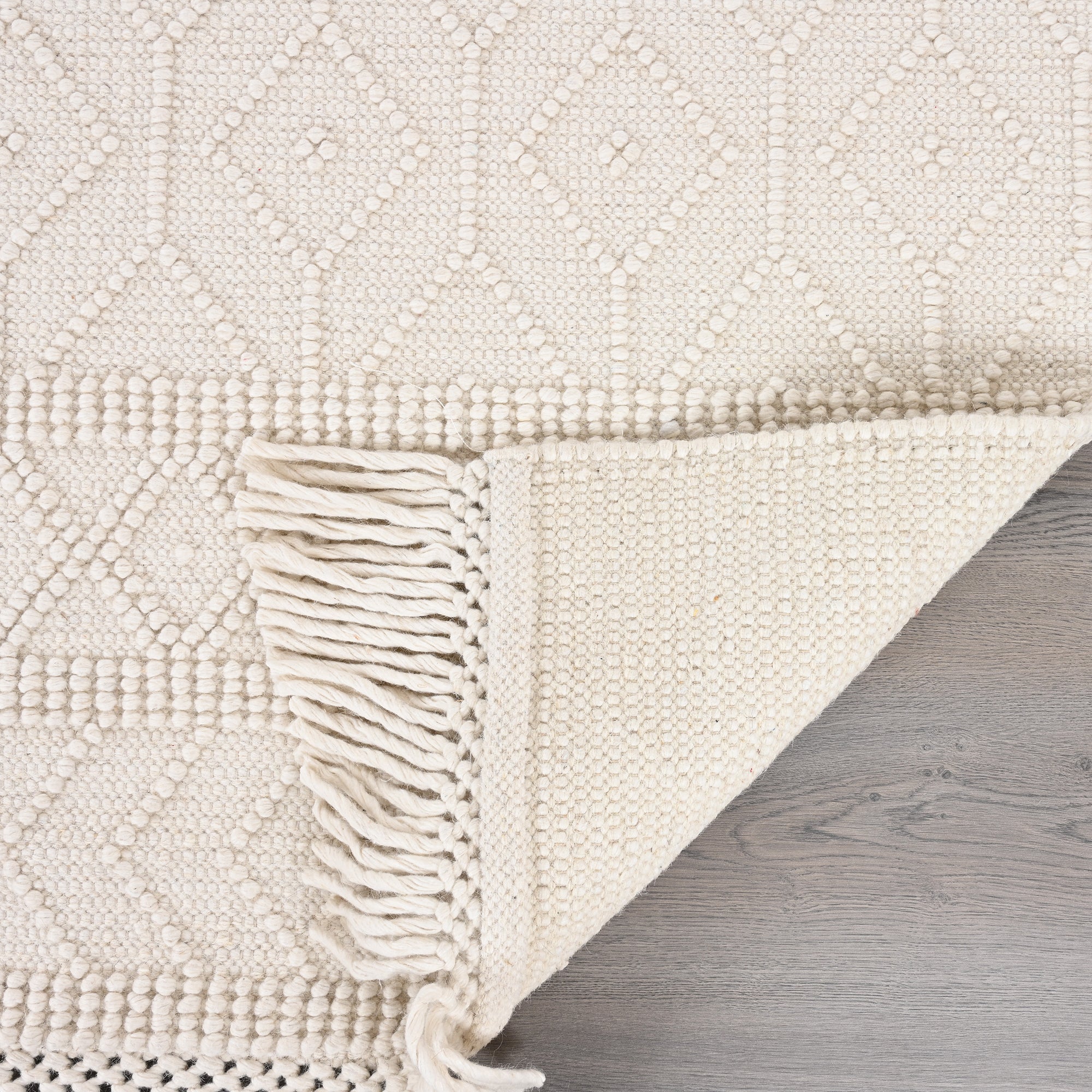 Handwoven Wool & Cotton Ivory Rug - Textured Neutral Area Rug with Fringe | Artisan Boho Minimalist Rug by Rug Regalia