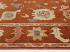 Hand-Knotted Oushak Wool Rug - Terracotta Red with Blue & Beige Accents | Luxury Turkish Handmade Carpet by Rug Regalia